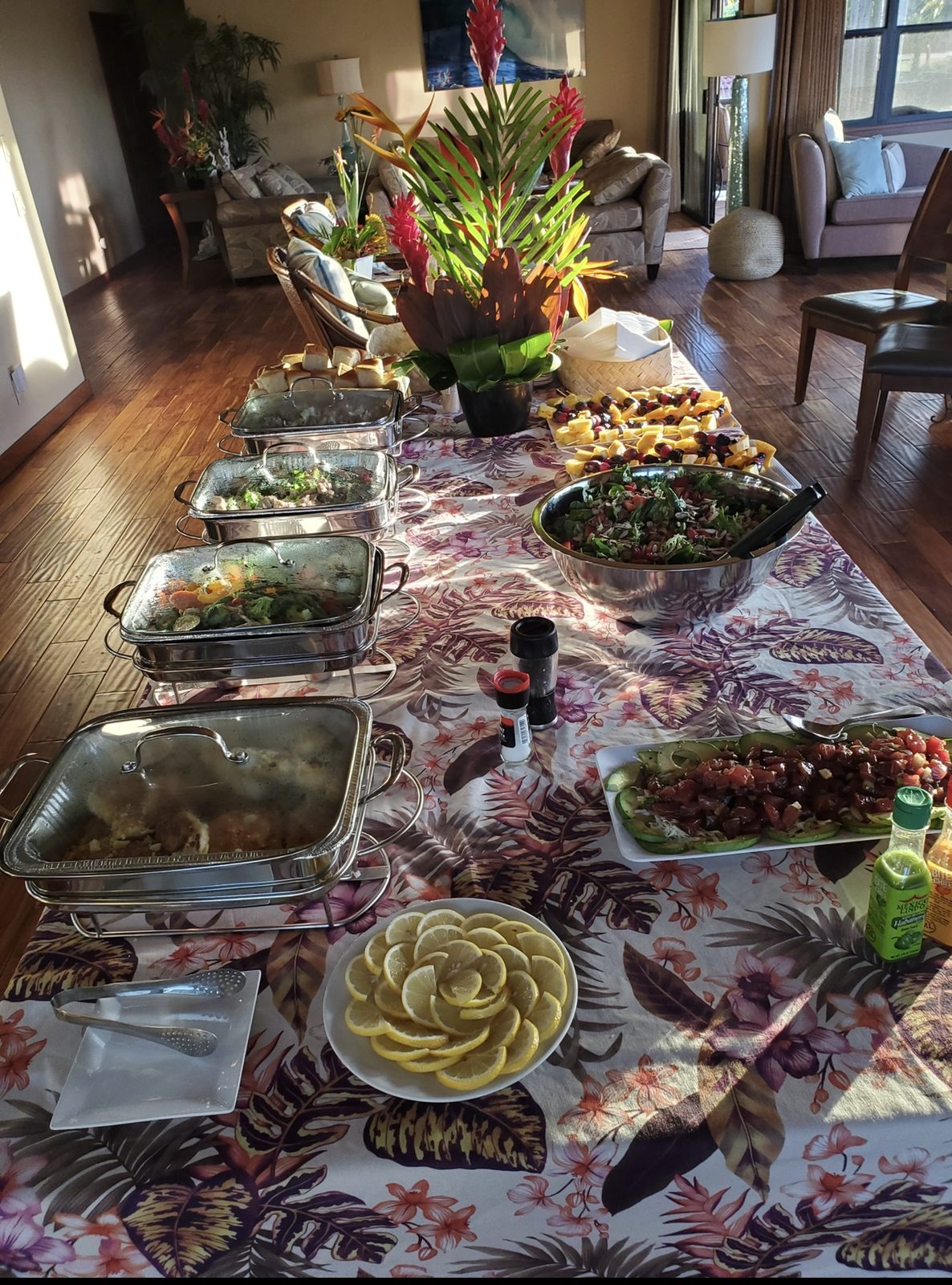 A buffet laid out in chafing dishes and platters