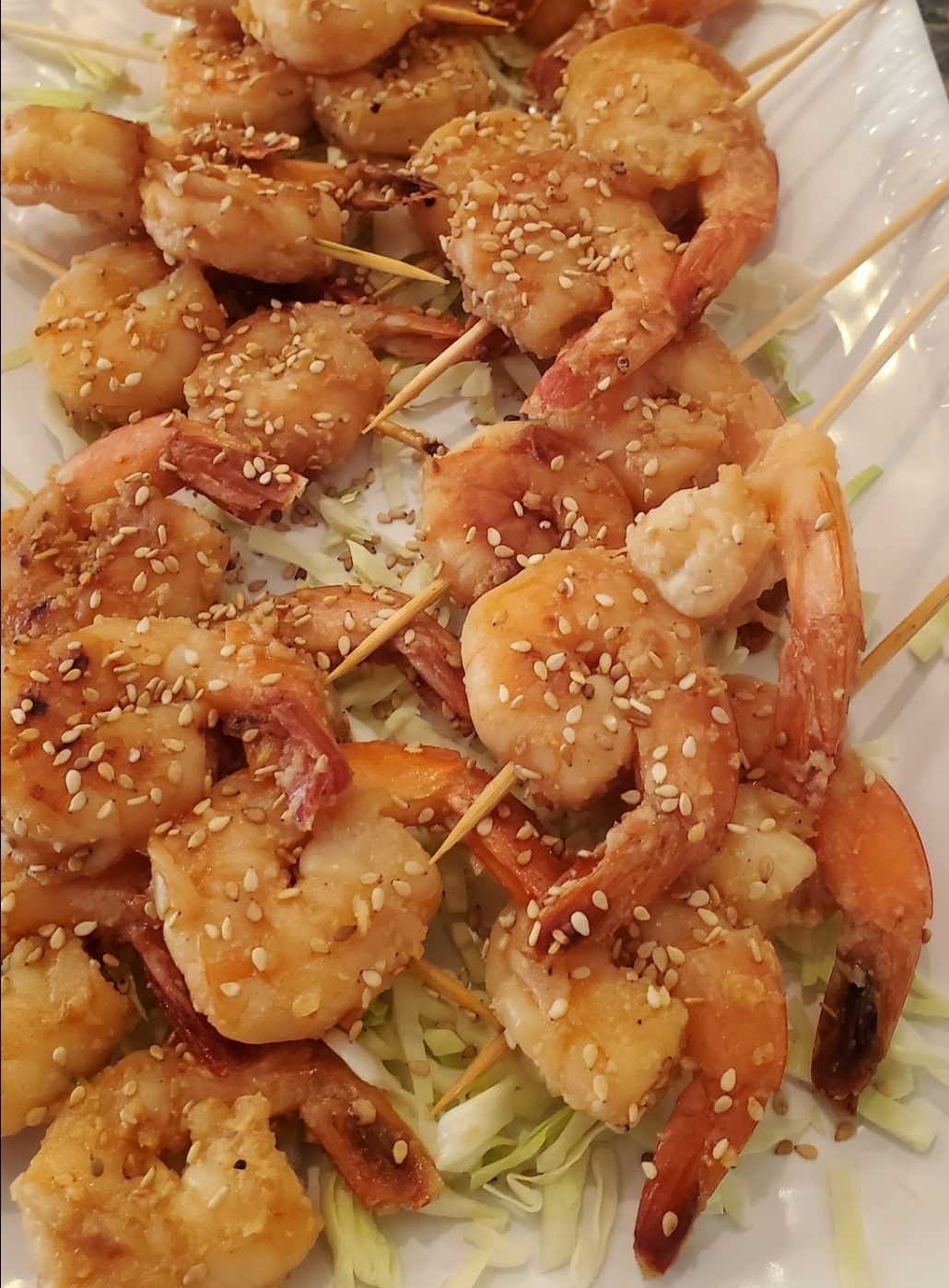 Garlic shrimp on the skewer with sesame
