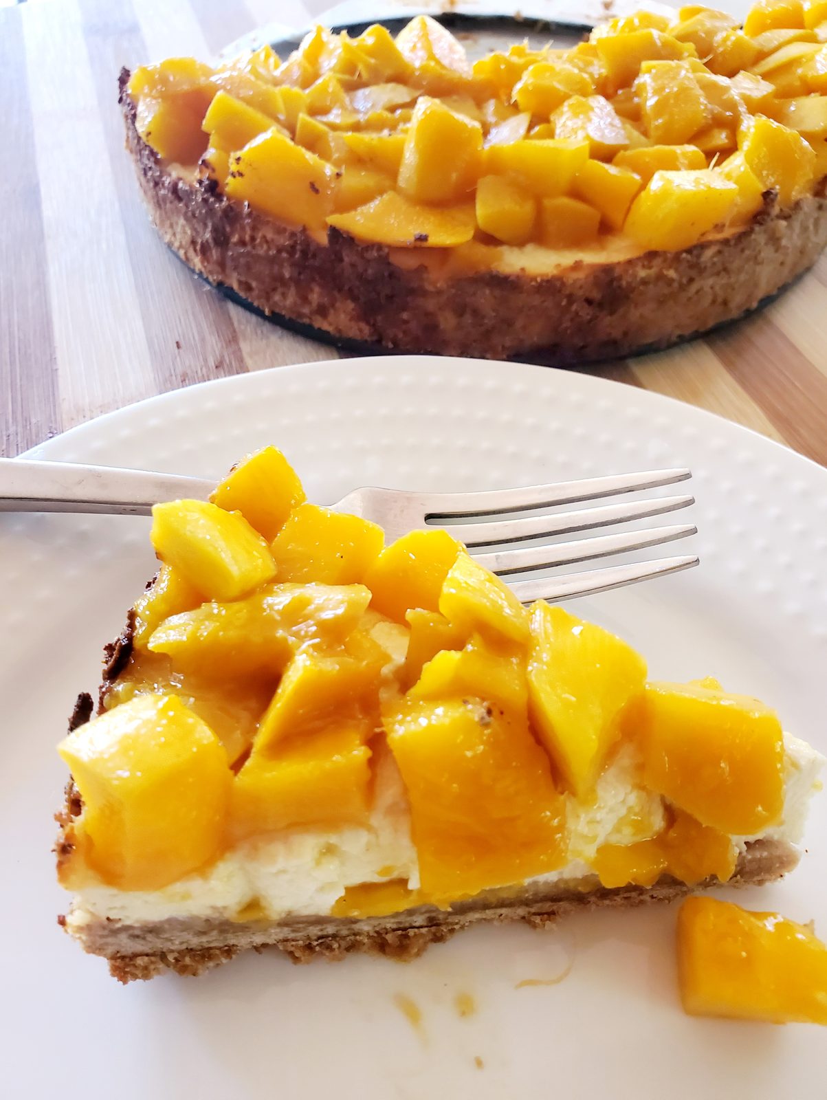 A slice of mango cheesecake