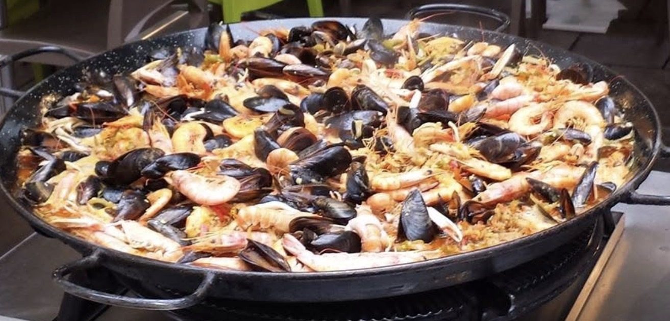 Mixed seafood paella in the pan