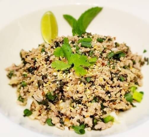 Laab ground pork chicken or beef with lime toasted rice shallots and mint
